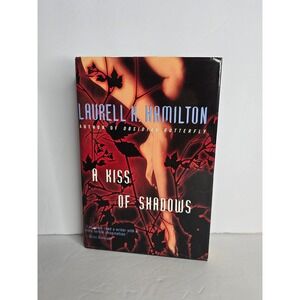 "A KISS OF SHADOWS"
